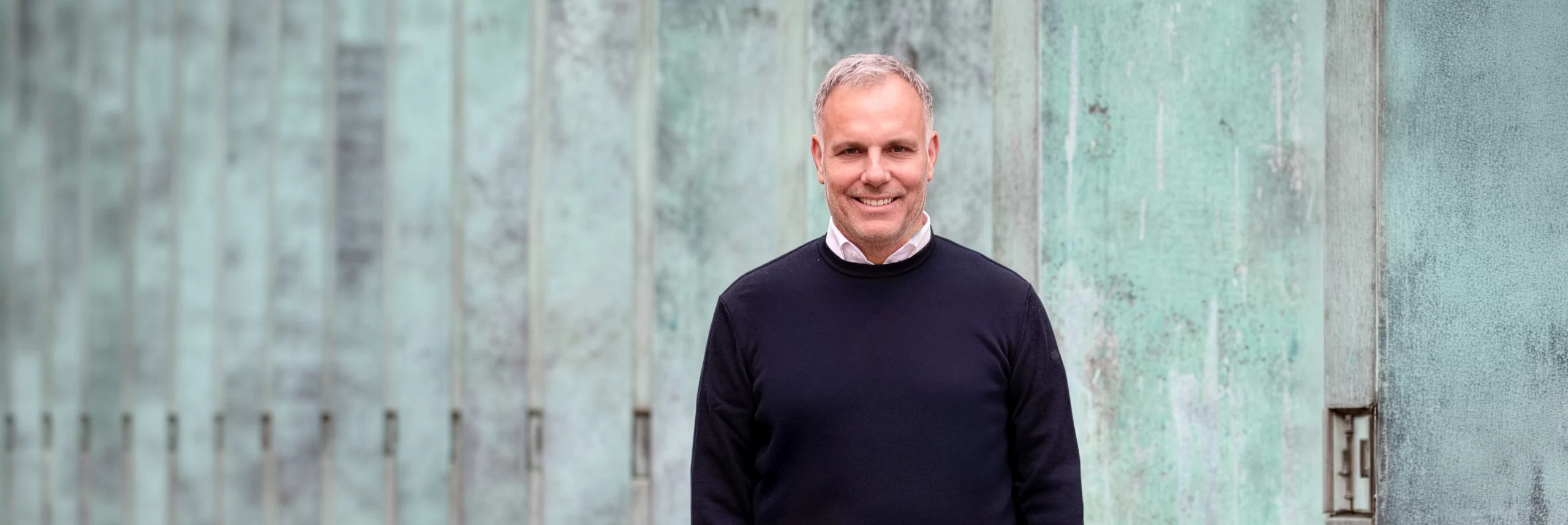 Eine Portraitaufnahme vom Immobilienmakler Frank Herres. 